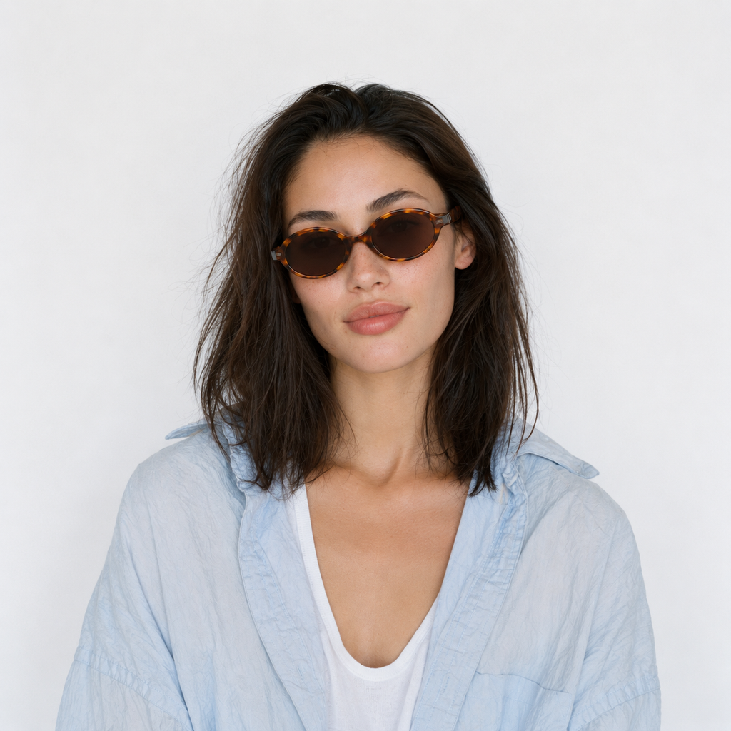 SET 05 — Plus One sunglasses in Tortoiseshell with brown lenses, worn by a model, front