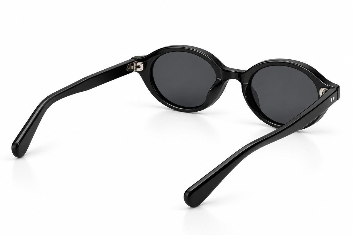 SET 05 — Plus One sunglasses in Black with grey lenses, back three-quarter view